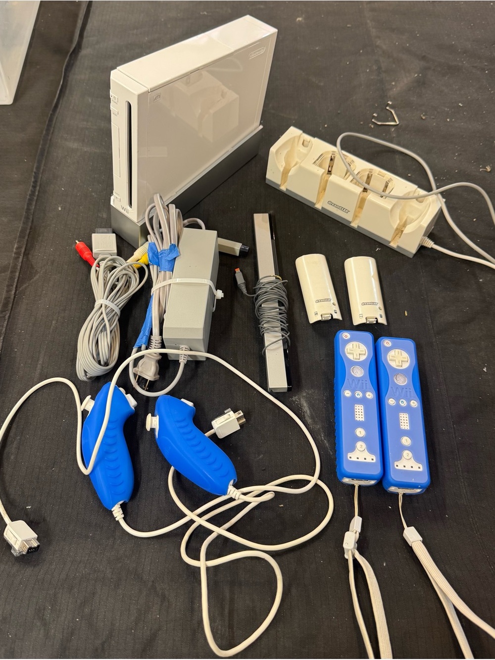 Nintendo White Wii Console with Blue Remotes and Blue Nunchuks